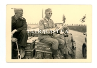 German Soldiers Sitting on Captured British Metal Ammunition Boxes, France 1940, Original WW2 Photo